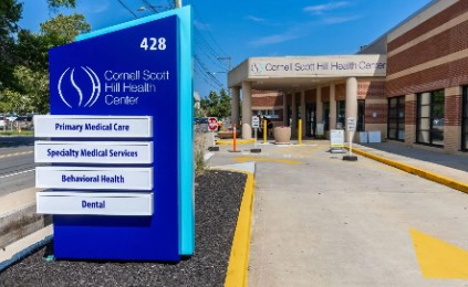 Entrance and exterior signage of Cornell Scott–Hill Health Center in Connecticut.