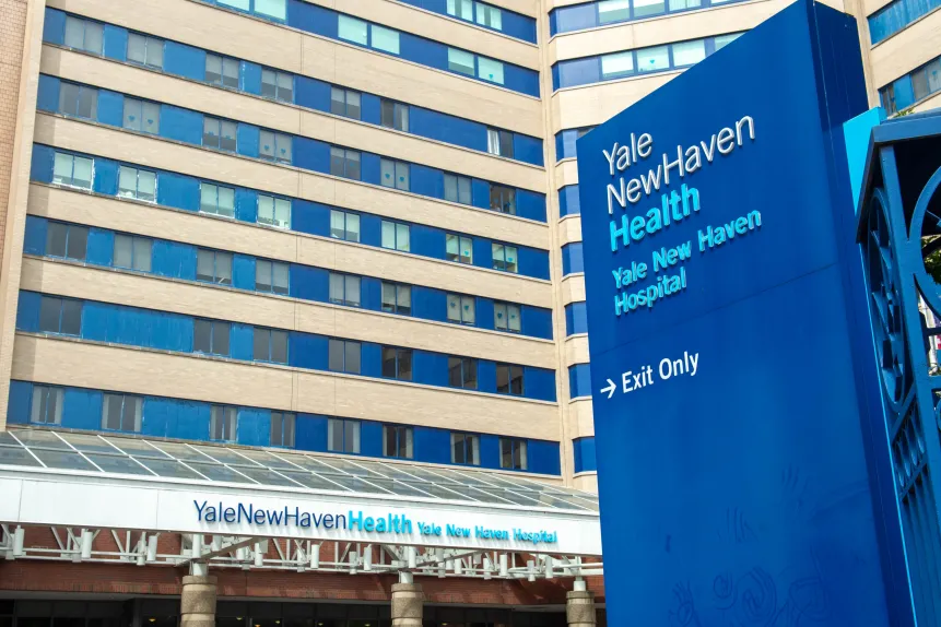 Yale New Haven Health Hospital main building, home to one of the largest healthcare uniform programs powered by Work Hard Dress Right.