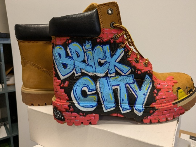 Custom Brick City artwork on a work boot celebrating Newark, New Jersey